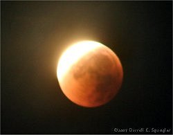 Moon emerging from Earth's shadow on Tuesday morning