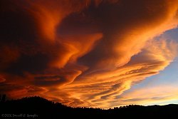 Lenticular Clouds At Sunset